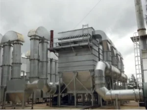 Industrial pollution control equipment for lead smelting plants with dust and fume extraction system.Air pollution control system for safe and eco-friendly lead recycling operations.Bag filter and wet scrubber system for controlling emissions in lead smelting industries